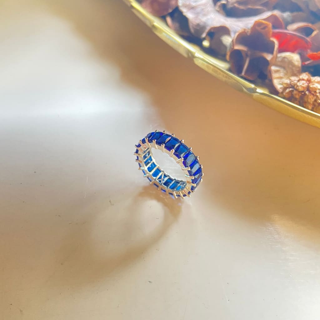 Emerald Cut Eternity Ring in Blue